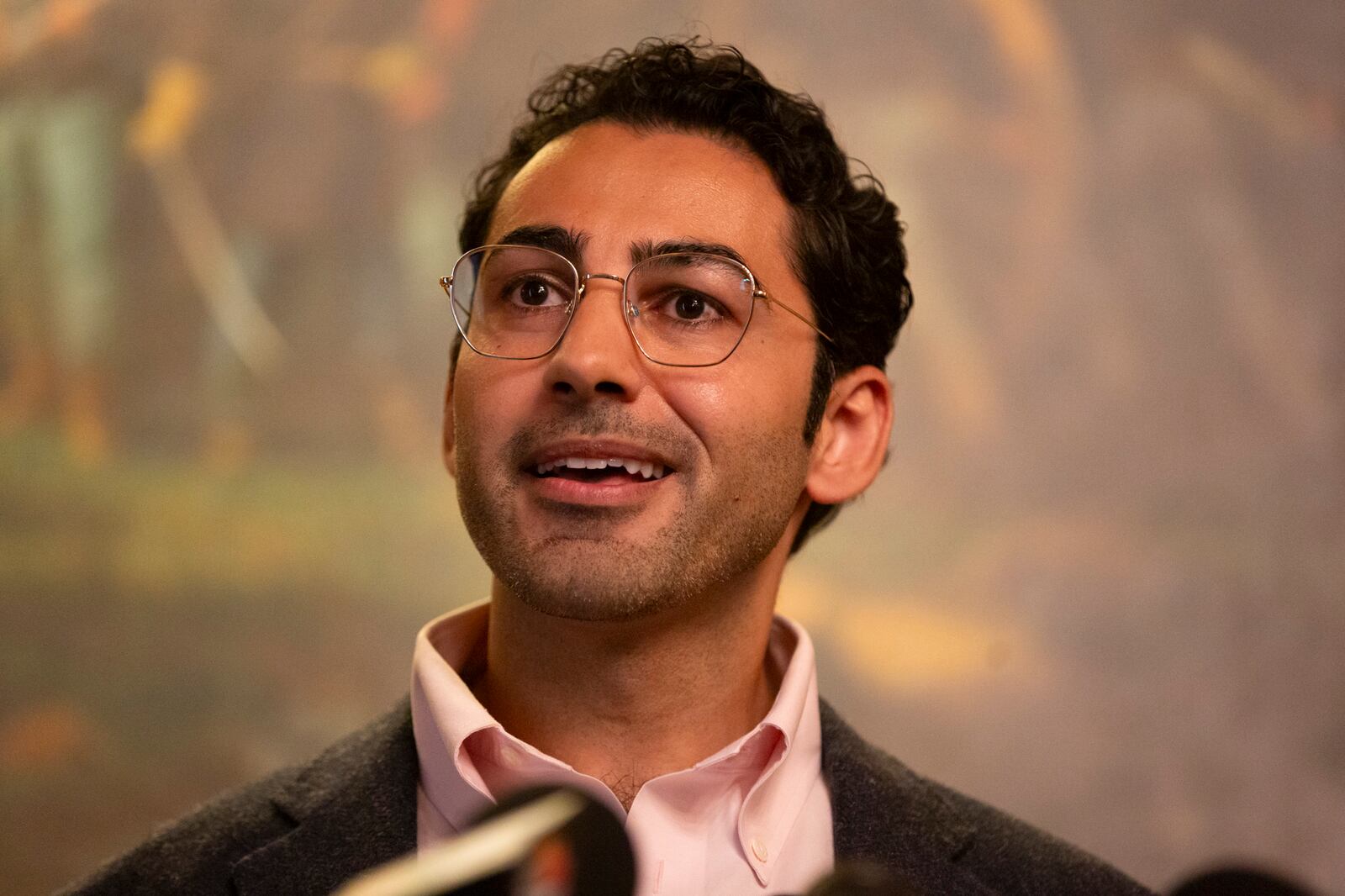 Mohsen Mahdawi speaks during a press conference announcing the launch of the Vermont Immigration Legal Defense Fund in the Cedar Creek Reception Room at the Vermont State House on Thursday, May 8, 2025, in Montpelier, Vt. (AP Photo/Alex Driehaus)