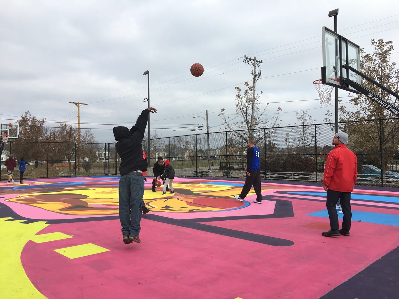 PHOTOS: Dayton’s youth enjoy their colorful, new Project Rebound  basketball court