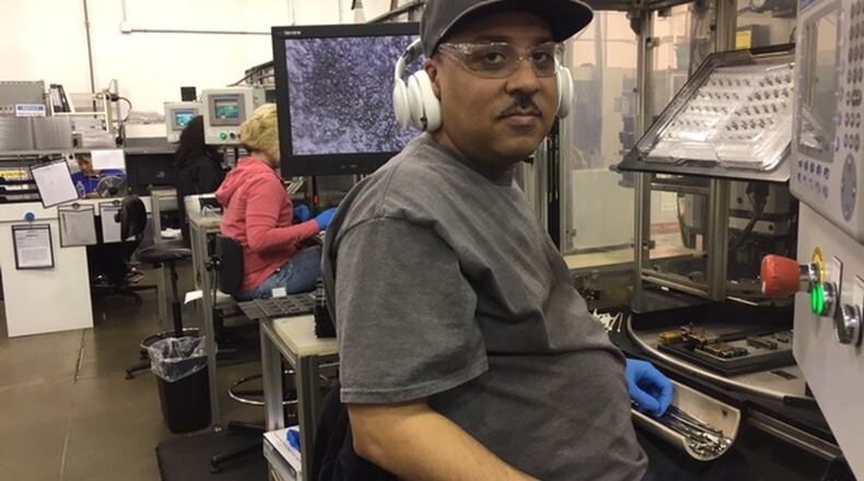 Norwood Medical employee James Johnson greets a visitor in this 2017 photo. THOMAS GNAU/STAFF