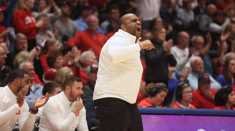 Dayton's Jermaine Henderson coaches during a game against Loyola Chicago on Saturday, Jan. 18, 2025, at UD Arena. David Jablonski/Staff