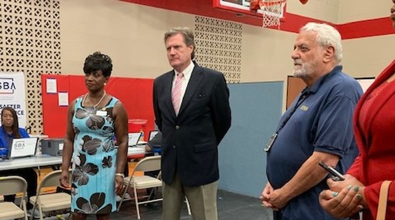 Trotwood Mayor Mary McDonald, Congressman Mike Turner and FEMA rep Paul Ferris at Trotwood-Madison High School touring the FEMA center. EMILY KRONENBERGER/STAFF PHOTO