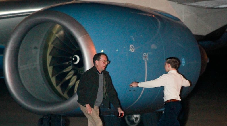 The plane carrying Jeffrey Fowle of West Carrollton, detained for more than five months in North Korea in 2014, greeted his son first upon arriving at Wright-Patterson Air Force Base. FILE PHOTO