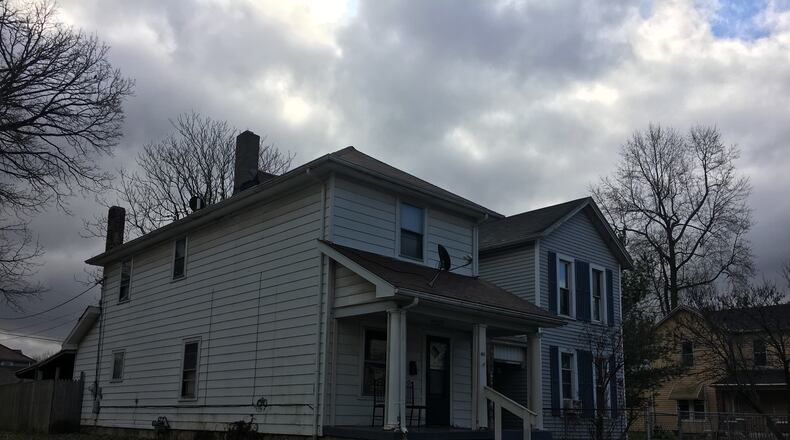 A Middletown man was found in this home in the 400 block of Young Street after he allegedly was shot in a local alley. RICK McCRABB/STAFF