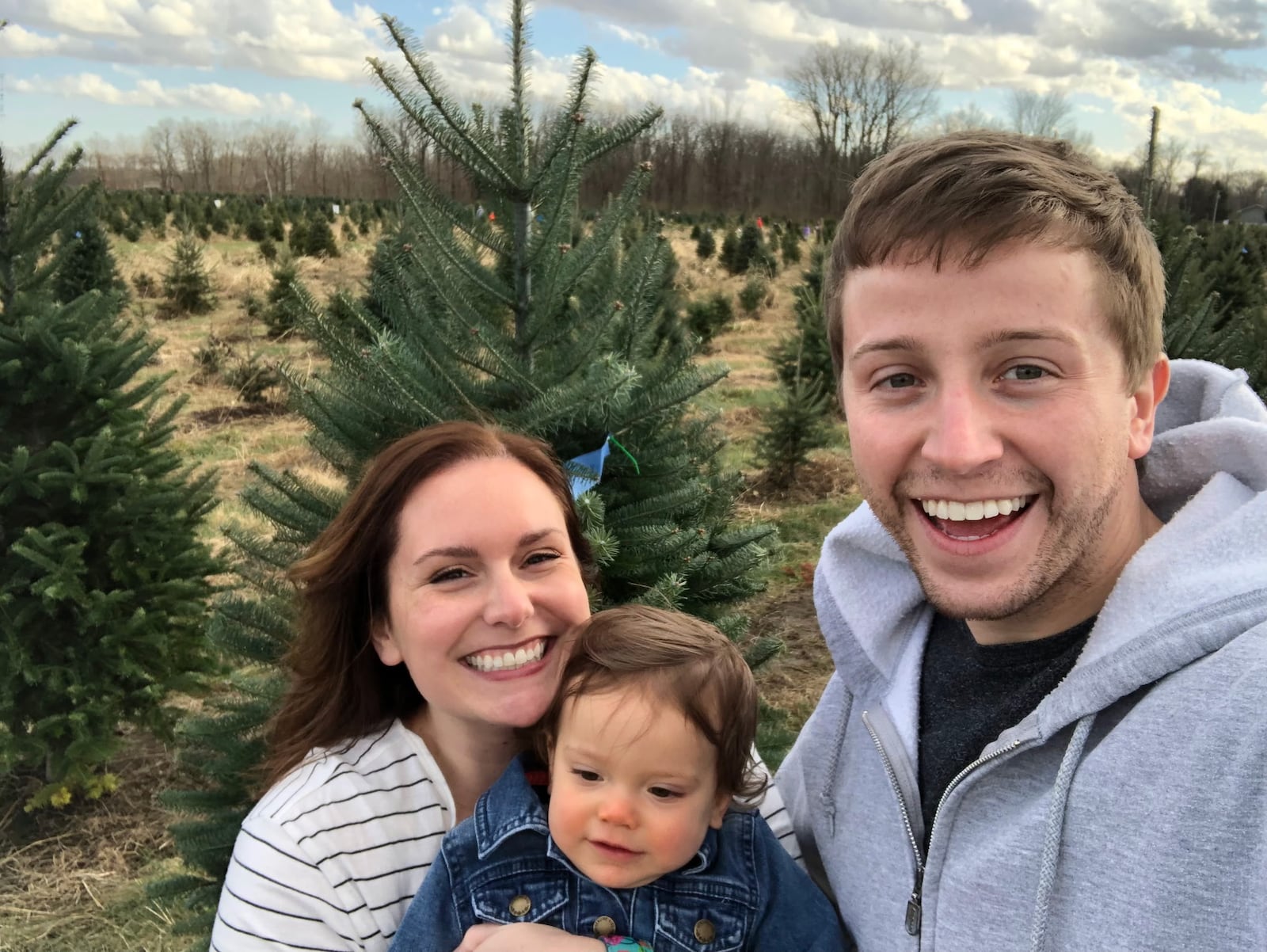 Meghan, Charlotte and Aaron Blake enjoying their daughter's first adventure in finding the family Christmas tree. CONTRIBUTED