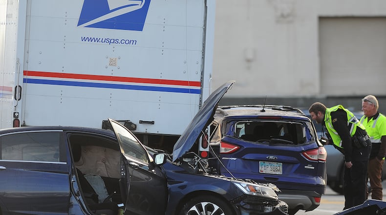 A multi-vehicle crash at the intersection of Keowee and Third streets Wednesday morning, Feb. 7, 2023. The intersection was temporarily closed as police investigated. MARSHALL GORBY\STAFF