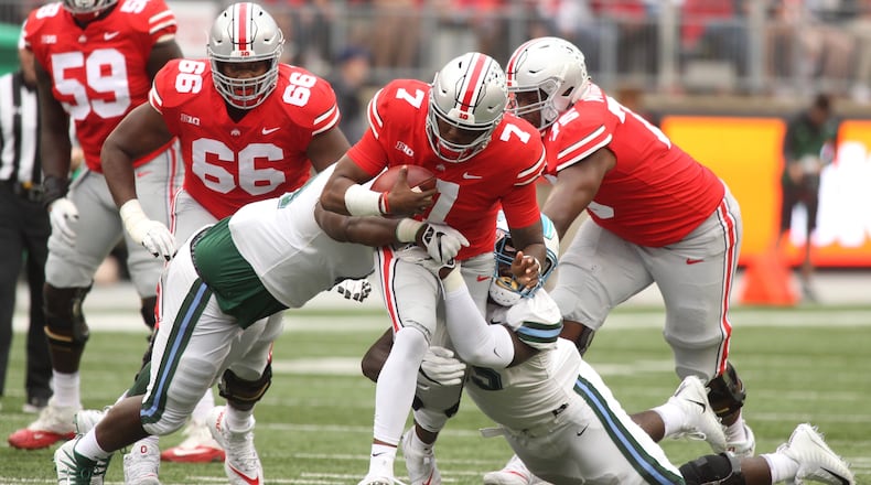 Ohio State’s Dwayne Haskins runs against Tulane on Saturday, Sept. 22, 2018, at Ohio Stadium in Columbus. David Jablonski/Staff