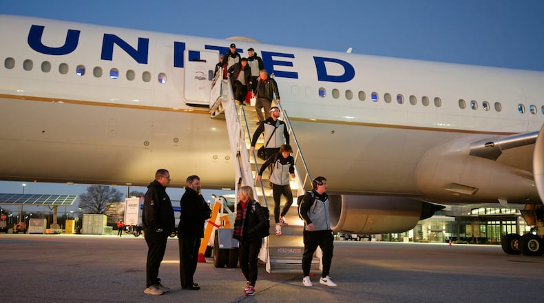 The Ohio State Buckeyes arrive at Atlanta Heartsfield-Jackson International Airport on December 25, 2022 in Atlanta, Georgia. No. 4 Ohio State will face No. 1 Georgia in the 2022 CFP Semifinal at the Chick-fil-A Peach Bowl on December 31, 2022 in Atlanta, Georgia. (Photo by Paul Abell/Chick-fil-A Peach Bowl)