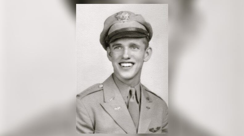 Teeriffic Sue in the Winner’s Circle at River Downs after winning The Ohio Discovery Stakes on the Fourth of July in 1998. Co-owners Wilbur Johnston (second from right), Rob Fridley (third from right) and Rob’s wife Sue (next to him) stand behind victorious and muddied jockey John Neagle, who is holding the race trophy with the Fridley’s youngest son Wil (named after Johnston). Tee Johnston, Wilbur’s wife (far left), is with the Fridleys oldest son, Nate. The winning bay filly was named after Tee and Sue. (CONTRIBUTED PHOTO)