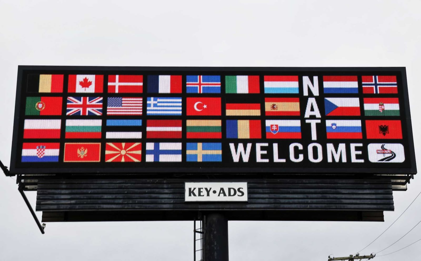 A billboard near Brunch Club between S Patterson and S Ludlow welcomes visitors to the NATO Parliamentary Assembly in Dayton, Thursday, May 22, 2025. NICK GRAHAM/STAFF