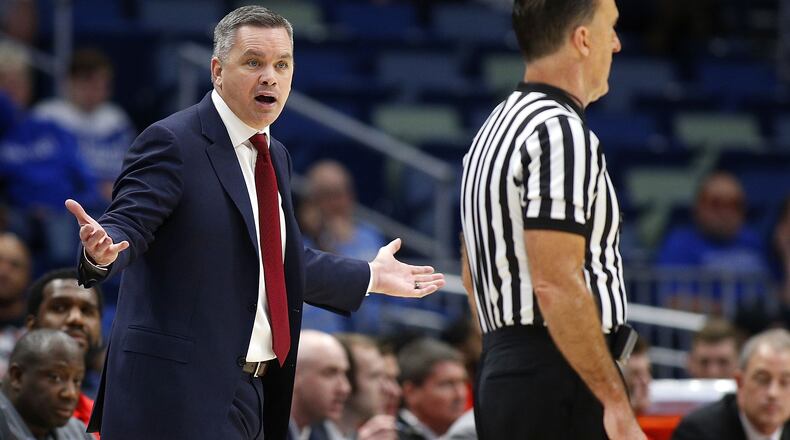 NEW ORLEANS, LA - DECEMBER 23: Head coach Chris Holtmann of the Ohio State Buckeyes reacts during the first half of the CBS Sports Classic against the North Carolina Tar Heels at the Smoothie King Center on December 23, 2017 in New Orleans, Louisiana.  (Photo by Jonathan Bachman/Getty Images)