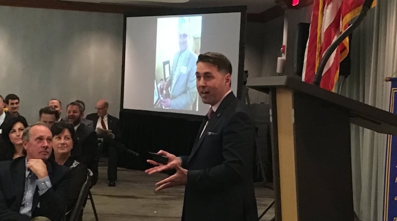 Hamilton City Manager Joshua Smith (pictured) and Mayor Pat Moeller spoke Thursday as part of the city’s State of the City presentation. MIKE RUTLEDGE / STAFF