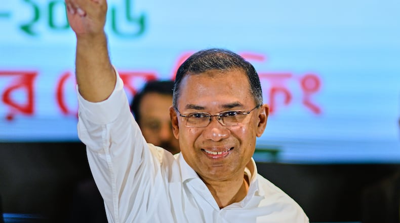 Bangladesh Nationalist Party Chairperson Tarique Rahman shows victory sign during a meeting with media after his party won the national parliamentary election, in Dhaka, Bangladesh, Saturday, Feb. 14, 2026. (AP Photo/Mahmud Hossain Opu)