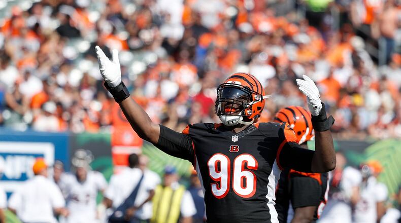 CINCINNATI, OH - SEPTEMBER 25: Carlos Dunlap #96 of the Cincinnati Bengals celebrates after a defensive stop during the third quarter of the game against the Denver Broncos at Paul Brown Stadium on September 25, 2016 in Cincinnati, Ohio. (Photo by Joe Robbins/Getty Images)