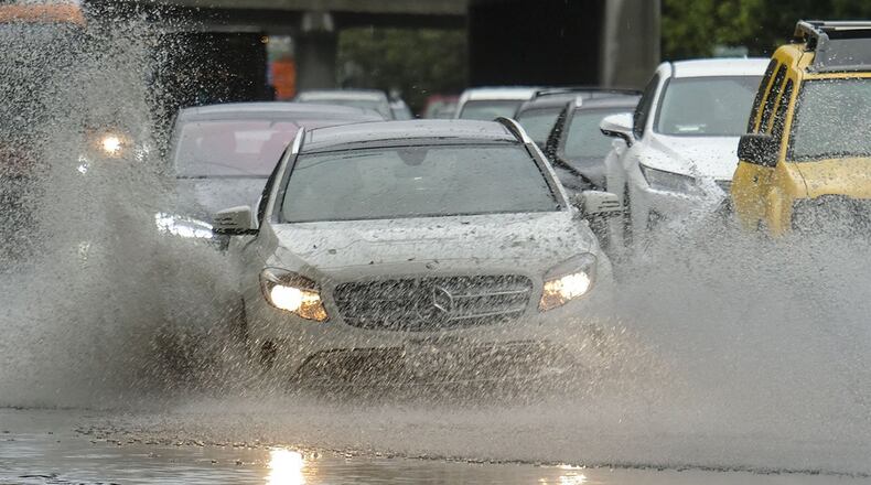 Cars drive on a flooding road during a rain storm on Nov. 29, 2018 in Los Angeles. (Ringo Chiu/Zuma Press/TNS)