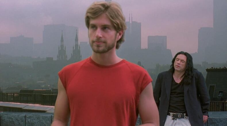 A scene from "The Room" with Greg Sestero (foreground) and Tommy Wiseau (background). CONTRIBUTED