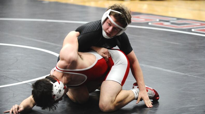 Covington senior Keringten Martin won the Division III 152-pound sectional title against Milton-Union senior Dylan Schenck 3-2 at Covington High School on Saturday. Greg Billing / Contributed