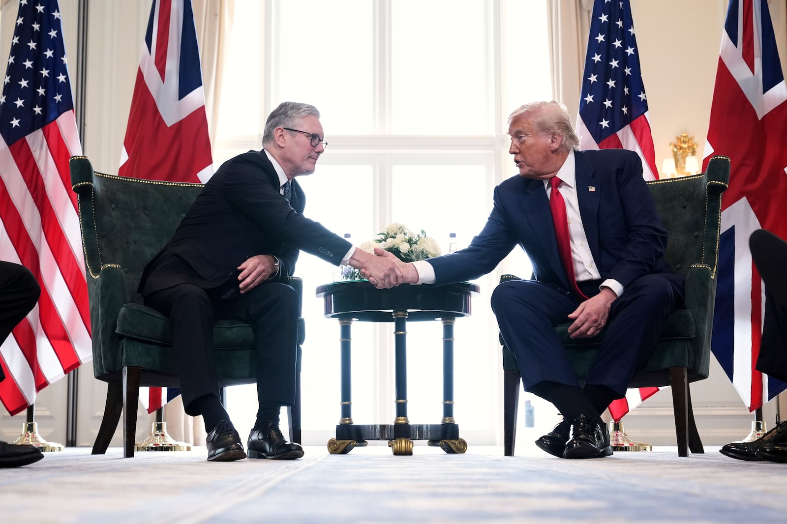 President Donald Trump, right, shakes hands with Britain's Prime Minister Keir Starmer during a meeting at the Trump Turnberry golf course in Turnberry, Scotland Monday, July 28, 2025. (AP Photo/Jacquelyn Martin)