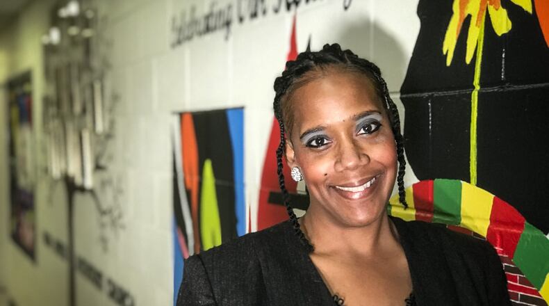 Dayton educational artist, Shirley Tucker, has paint 20 murals around town with the help of youth in the juvenile justice system.