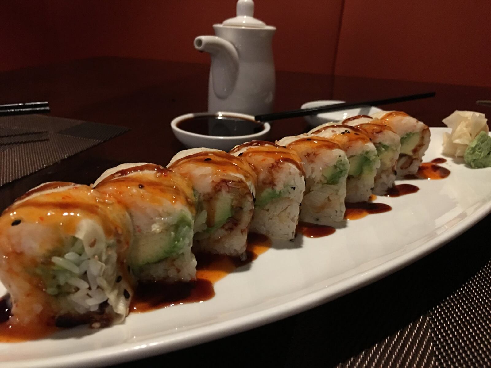 The snowflake roll ($15) dressed with grilled sea bass, spicy lobster and avocado wrapped in soy bean or and served with an orange mayo and eel sauce is a decadent, creamy option that is as rich and savory as it sounds. Contributed photo by Alexis Larsen