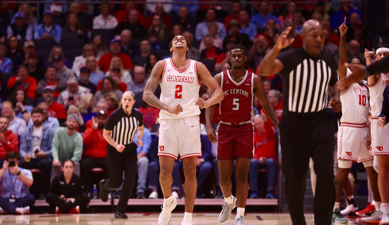 Dayton's De'Shayne Montgomery reacts after a defensive stop against North Carolina Central on Saturday, Nov. 22, 2025, at UD Arena. David Jablonski/Staff