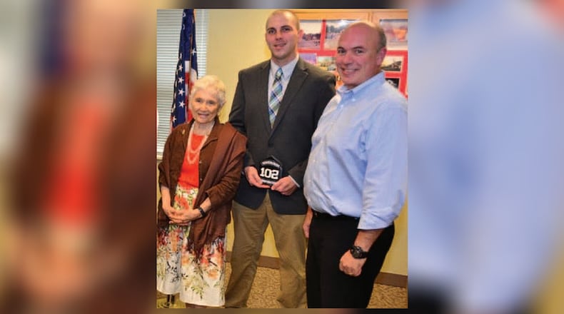 Todd Lohse, center, pictured with former Beavercreek Twp. Trustee Carol Graff and Trustee Tom Kretz. Contributed