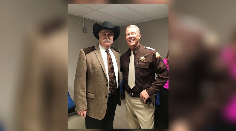Butler County Sheriff Richard K. Jones with Metallica lead signer James Hetfield during filming of Ted Bundy biopic movie Extremely Wicked, Shockingly Evil and Vile, starring Zac Efron. SUBMITTED