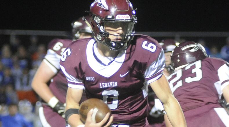 Lebanon quarterback Dakota Allen, shown during a 55-20 loss to visiting Miamisburg on Oct. 14, 2016, has graduated and moved on to Eastern Kentucky University. Junior Kyle Short is the Warriors’ new quarterback this season. MARC PENDLETON/STAFF