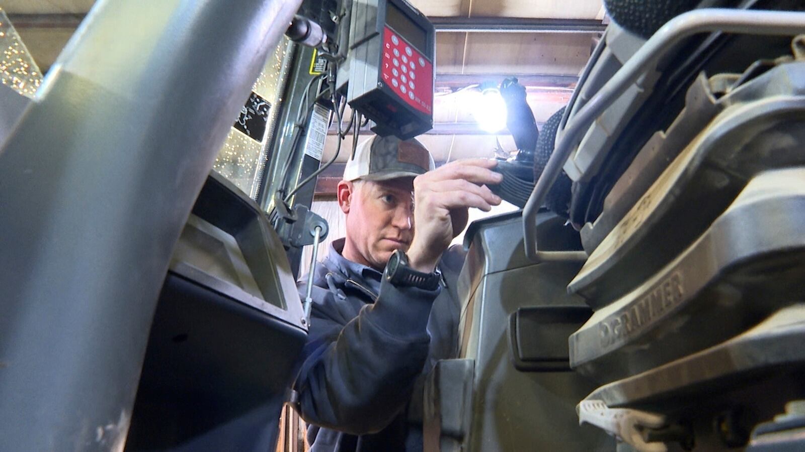 Bryant Kagay, part owner of Kagay farms in Amity, Missouri, works on equipment to get ready for planting his crops this year while worrying about the effects of President Donald Trump's tariffs, Friday, April 4, 2025. (AP Photo/Nick Ingram)