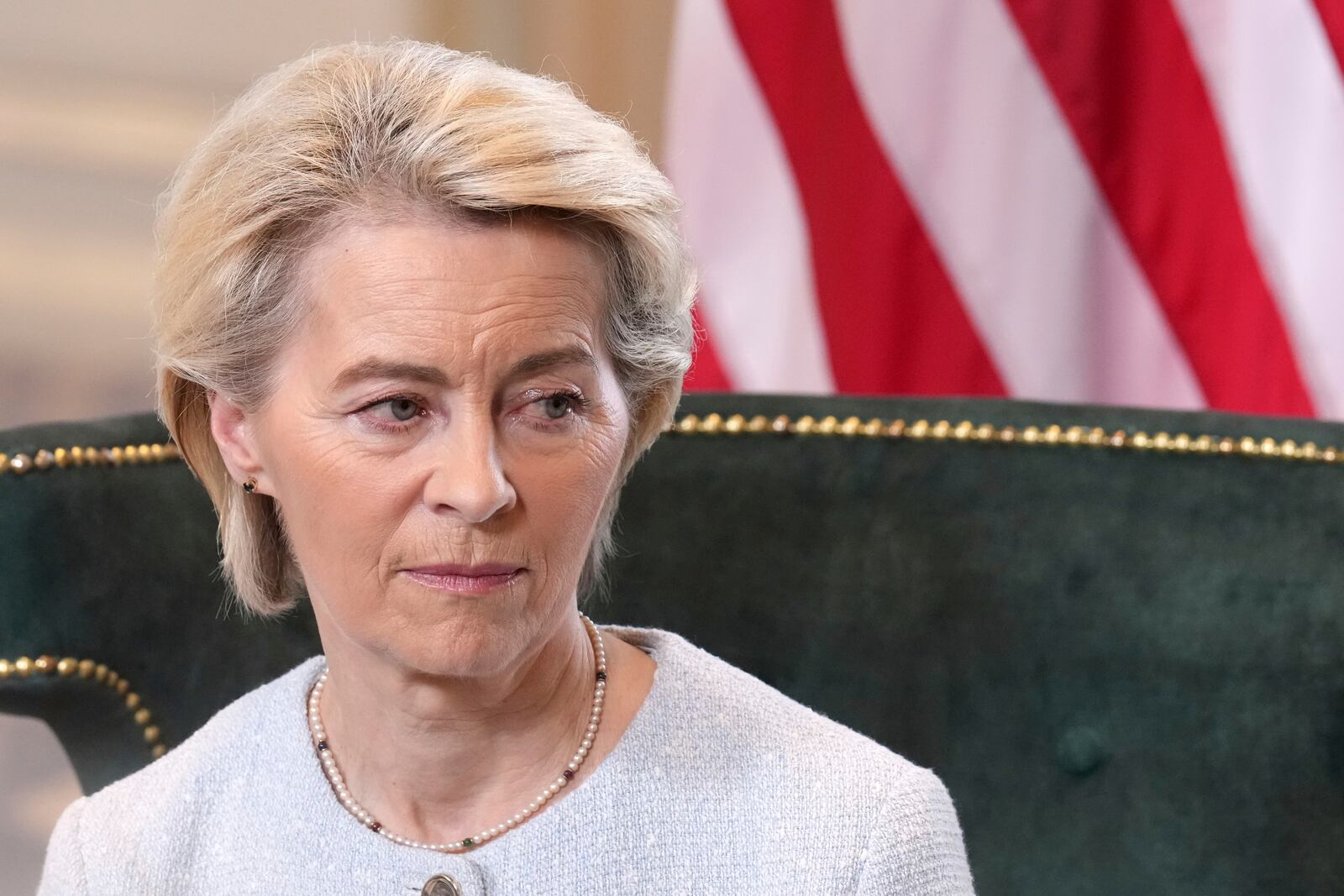 European Commission President Ursula von der Leyen listens as she meets President Donald Trump at the Trump Turnberry golf course in Turnberry, Scotland Sunday, July 27, 2025. (AP Photo/Jacquelyn Martin)