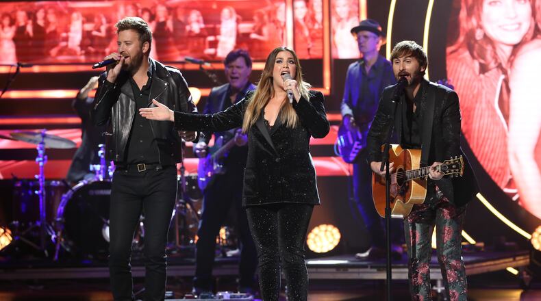 NASHVILLE, TENNESSEE - OCTOBER 16:  (L-R) Charles Kelley, Hillary Scott and Dave Haywood of Lady Antebellum perform onstage during the 2019 CMT Artists of the Year at Schermerhorn Symphony Center on October 16, 2019 in Nashville, Tennessee. (Photo by Terry Wyatt/Getty Images)