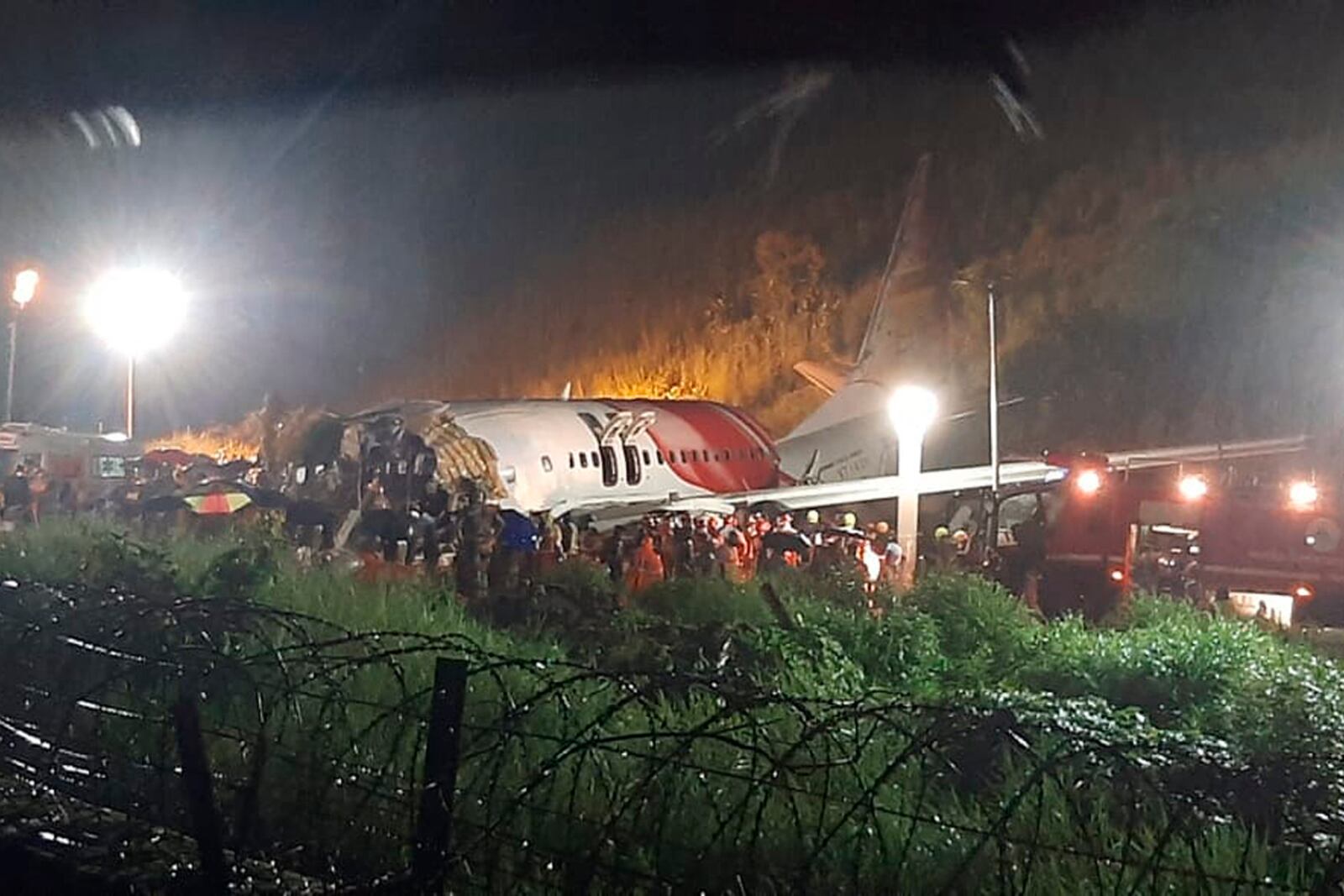 FILE - The Air India Express flight that skidded off a runway while landing at the airport in Kozhikode, Kerala state, India, Friday, Aug. 7, 2020. (AP Photo, File)