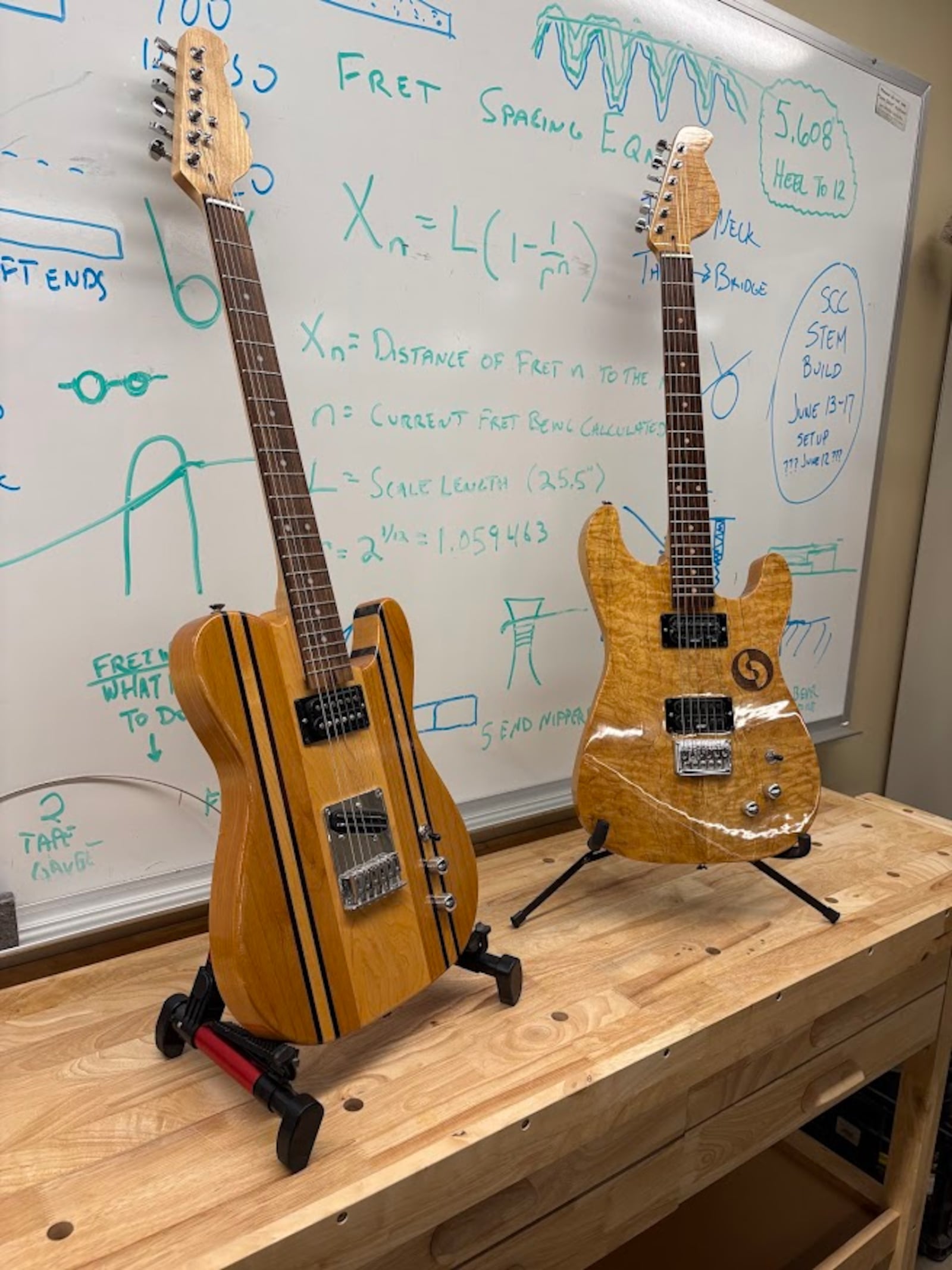 A pair of solid-body electric guitars built in the Guitar Lab by Sinclair Community College students. THOMAS GNAU/STAFF