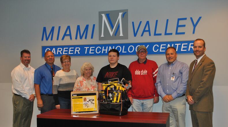 Dallas Law (center) recieved the Jonathan Fultz Memorial Scholarship. CONTRIBUTED