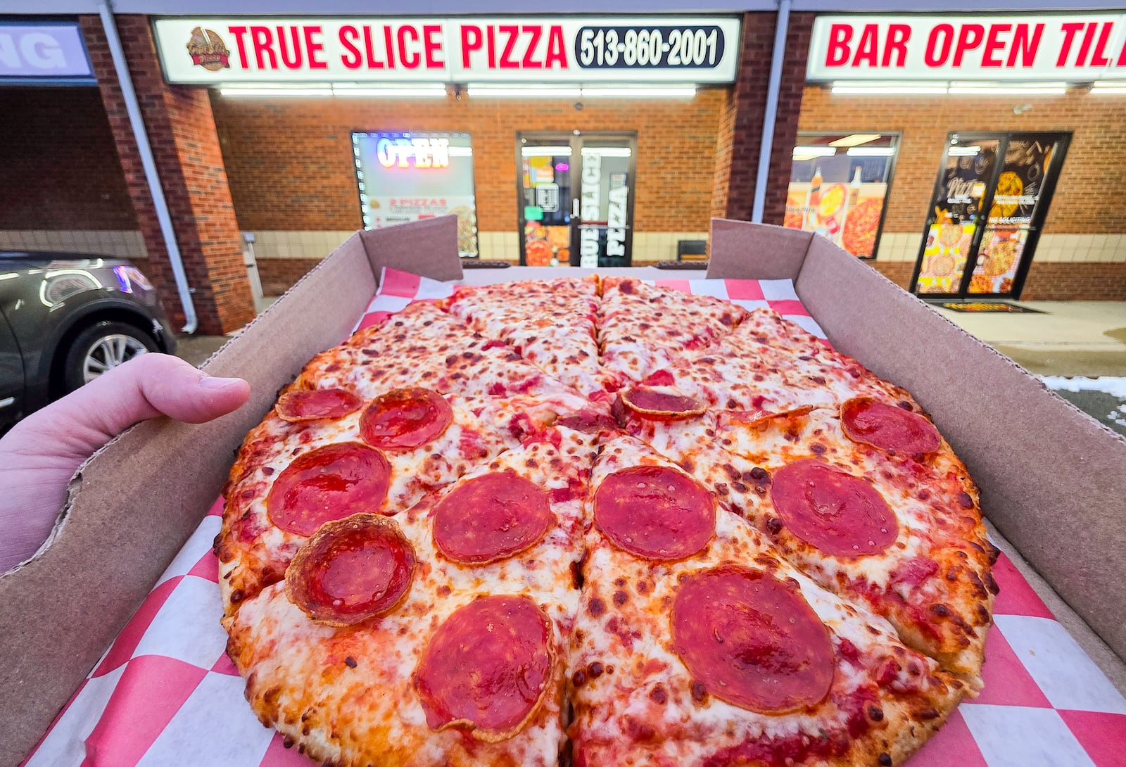 True Slice Pizza and bar is open at 8262 Princeton Glendale Road in West Chester Township. NICK GRAHAM/STAFF