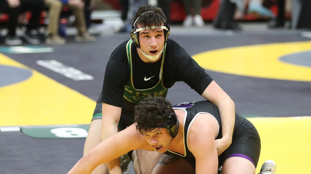 Catholic Central senior Brody Adams qualified for the Division III state wrestling tournament, which is being held this weekend at the Schottenstein Center in Columbus. DAVE THOMPSON / CONTRIBUTED PHOTO