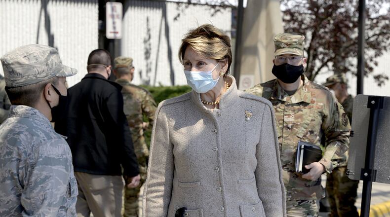 Secretary of the Air Force Barbara Barrett speaks with 88th Medical Group personnel at Wright-Patterson Air Force Base, April 21. Barrett met with Air Force personnel and toured several facilities, including the United States Air Force School of Aerospace Medicine Epidemiology Laboratory, which is responsible for analyzing a majority of the COVID-19 tests in the Air Force. (U.S. Air Force photo/Ty Greenlees)