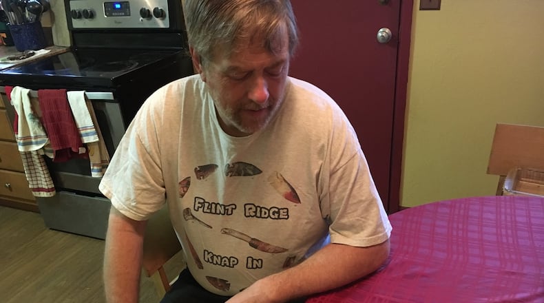 Tim Rau of Kettering looks over pharmacy receipts for insulin. He and other diabetics have been angered by rising insulin prices and a lack of transparency over the reasons. KATIE WEDELL/STAFF