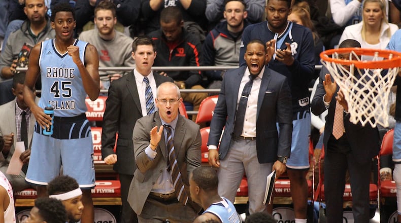 Rhode Island coach Dan Hurley claps after a stop by his team against Dayton in the first half. DAVID JABLONSKI / STAFF