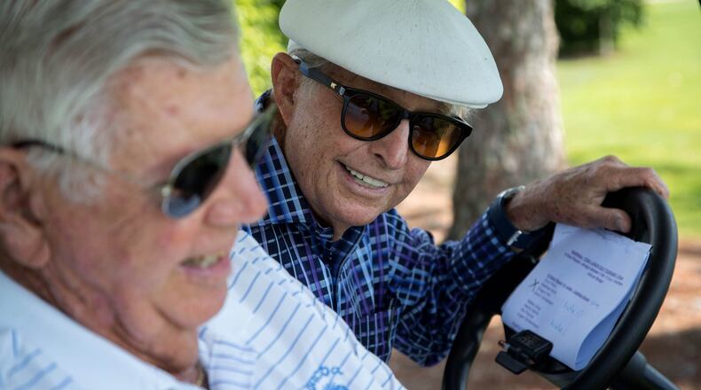 Still driving: Bob Toski (at the wheel) takes his financial adviser Bud Allen for a spin at the Fourth Annual Bob Toski Junior Tournament in Delray Beach last summer.Allen Eyestone / The Palm Beach Post