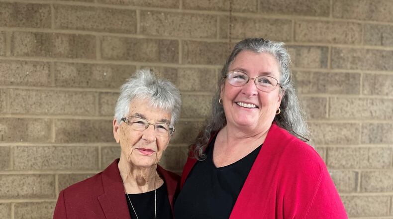 Maryjo Phillips, left, was inducted into the West Carrollton Plaza of Fame during a West Carrollton City Council meeting Tuesday, Sept. 28, 2021. She was joined by her daughter, Roberta Phillips (right), during a celebratory reception prior to city council’s regularly scheduled meeting. CONTRIBUTED