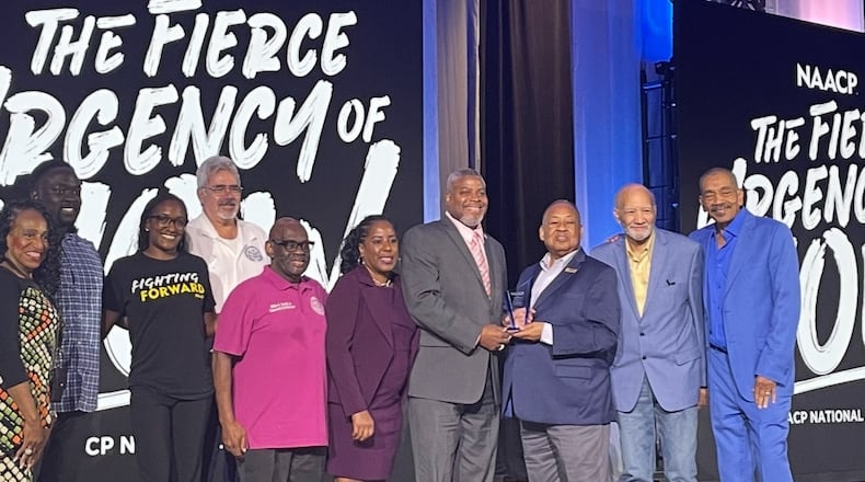 Delegates of the Dayton Branch of the NAACP receive Thalheimer Awards during the 116th NAACP National Convention, held in Charlotte, North Carolina. CONTRIBUTED