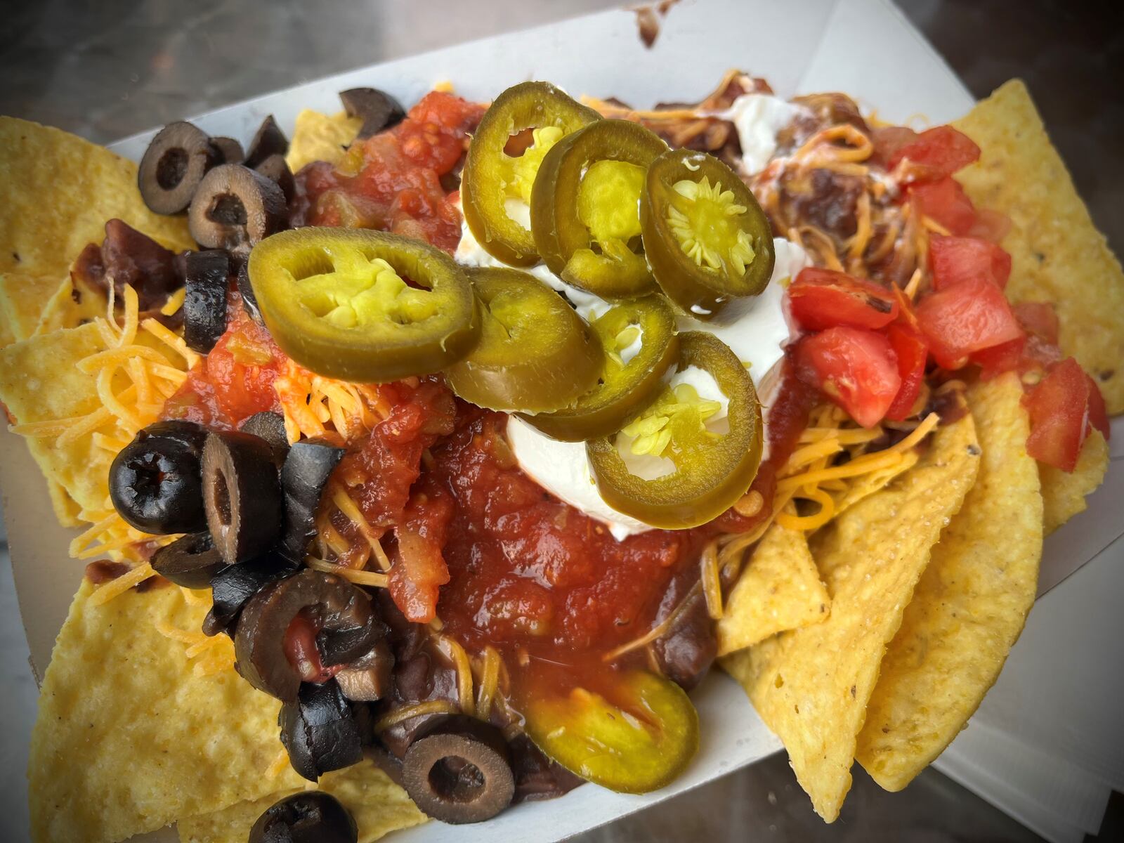 Current Cuisine served vegetarian overstuffed black bean nachos at the Yellow Springs Street Fair. NATALIE JONES/STAFF