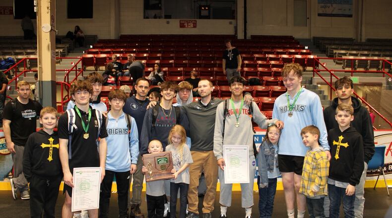 The Legacy Christian wrestling team after winning a Division III district title last week. CONTRIBUTED