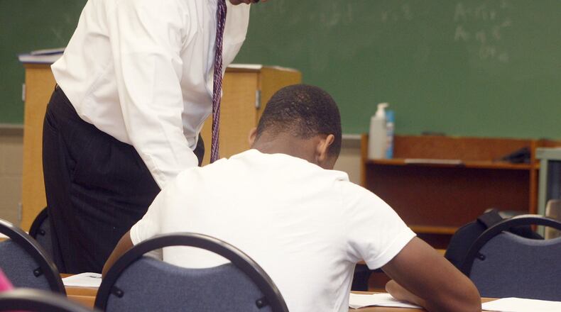 Richard Gates, superintendent of Jefferson Twp. schools, works with a student. Jefferson’s school board voted to oust both of the district’s principals last month, on a recommendation from Gates. FILE PHOTO