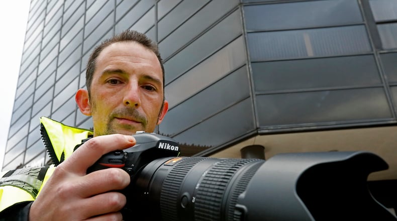 New Carlisle photographer Andy Grimm has a lawsuit pending in U.S. District Court in Dayton after he was shot by a Clark County Sheriff's deputy in September 2017 while he was trying to photograph an incident in New Carlisle.
