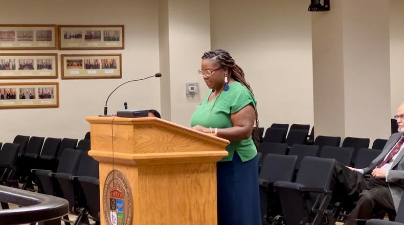 Dayton resident DaQuawna Dunnican testified against AES Ohio's proposed increase in electric rates during a public hearing on Thursday. AIMEE HANCOCK/STAFF