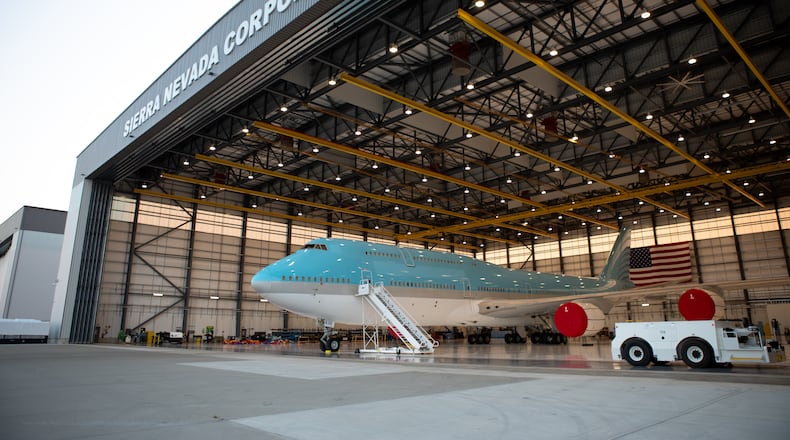 The arrival of a plane for modification work at one of Sierra Nevada Corp.'s Dayton hangars. Sierra Nevada photograph.