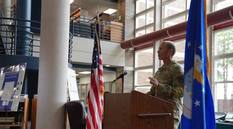Col. Karl Seekamp, deputy commander of the Air Force Research Laboratory (AFRL), speaks at the D'Azzo Library 25th Anniversary event at the library on Wright-Patterson Air Force Base in August. (Air Force photo by Kenneth M McNulty)
