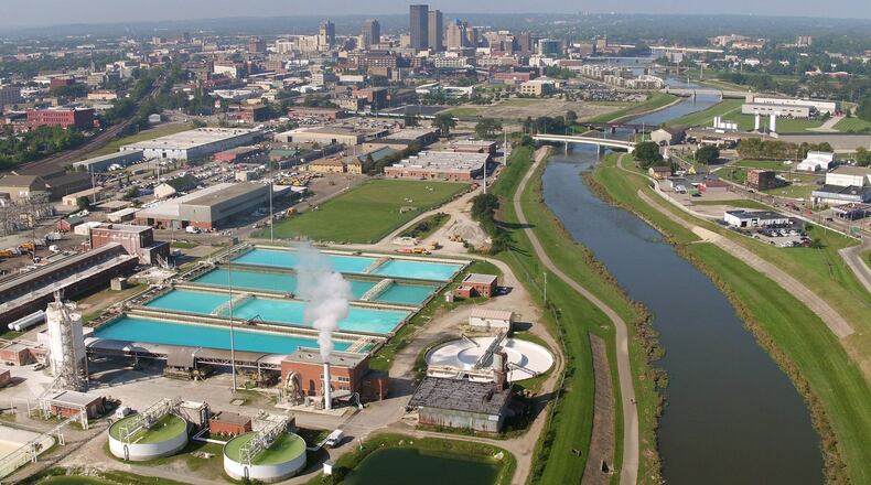 The Mad River flows past the city of Dayton’s Ottawa water treatment plant on the east side of Dayton. TY GREENLEES / STAFF