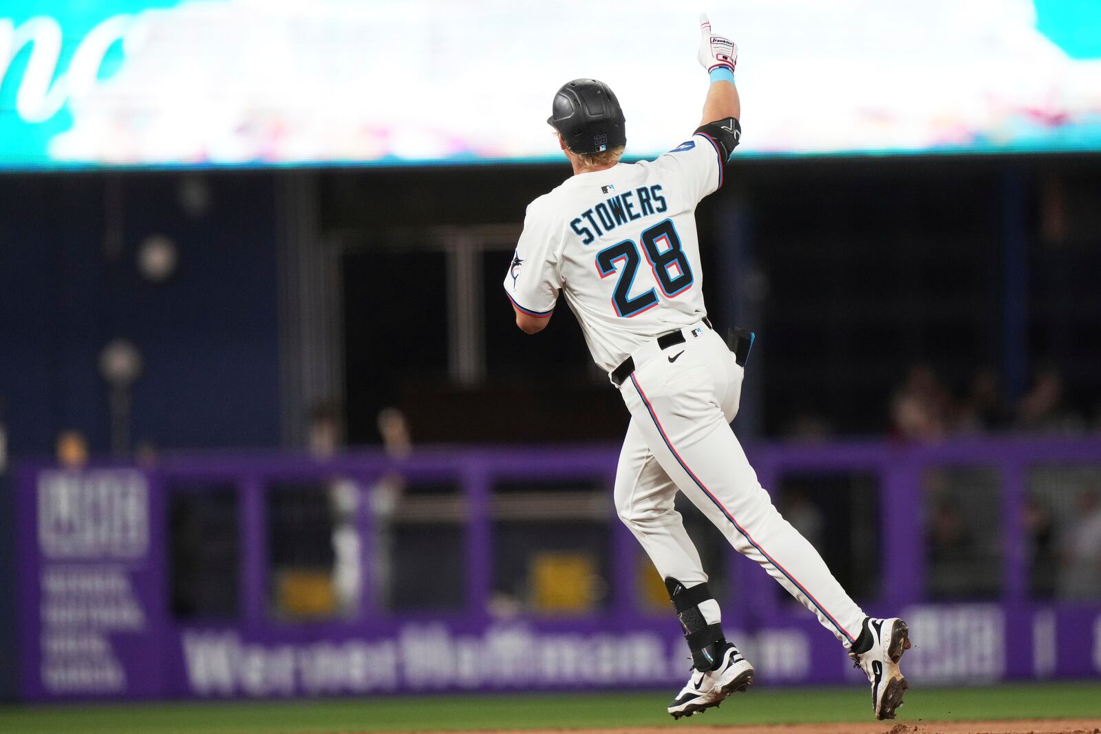 Miami Marlins' Kyle Stowers (28) runs the bases after hitting a three run home run during the seventh inning of a baseball game against the Cincinnati Reds, Monday, April 21, 2025, in Miami. (AP Photo/Lynne Sladky)